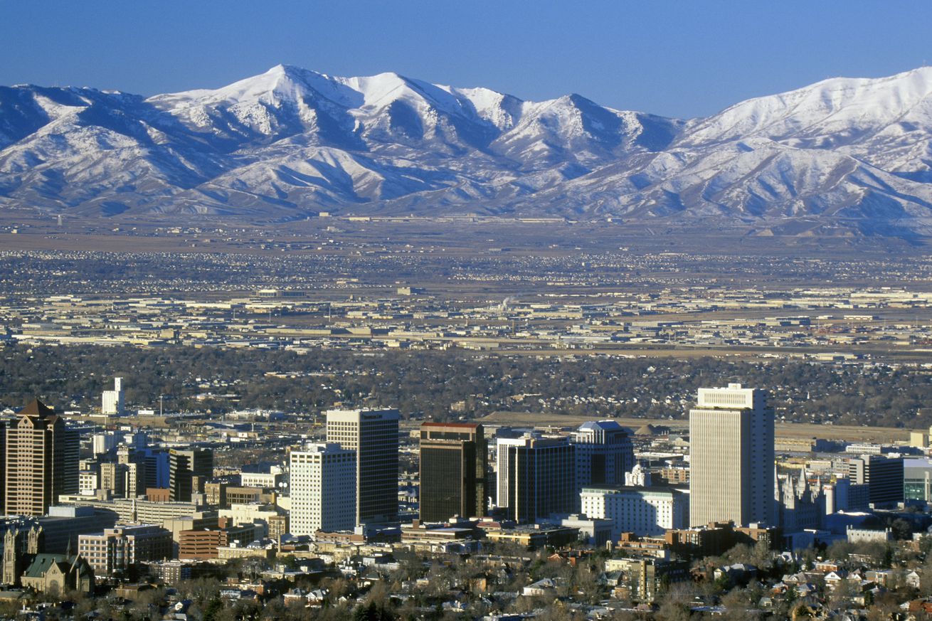 Skyline of Salt Lake City, UT with Snow capped Wasatch Mountains in background