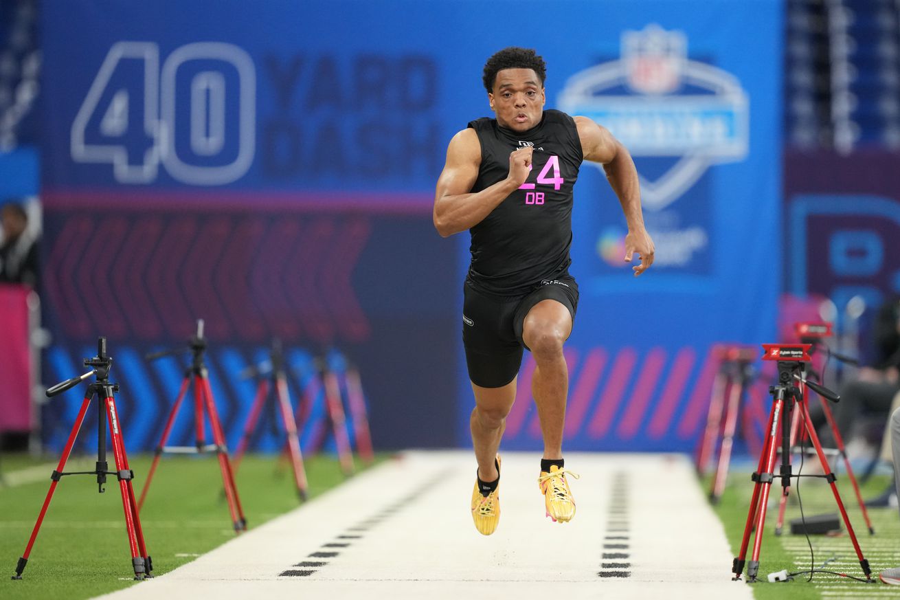 eb 28, 2025; Indianapolis, IN, USA; Kansas State defensive back Jacob Parrish (DB24) runs in the 40 yard dash during the 2025 NFL Combine at Lucas Oil Stadium.