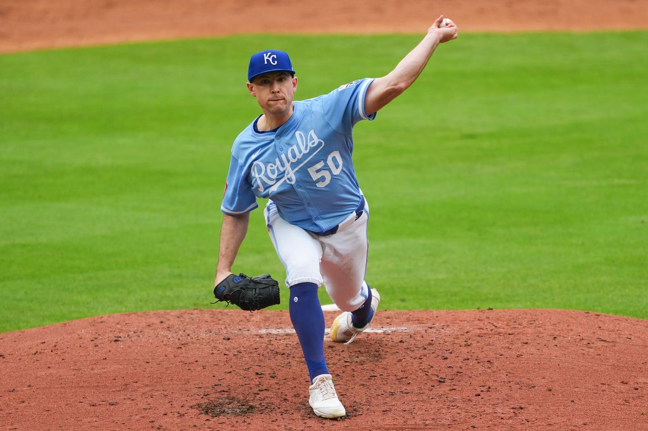 Kris Bubic throws a pitch