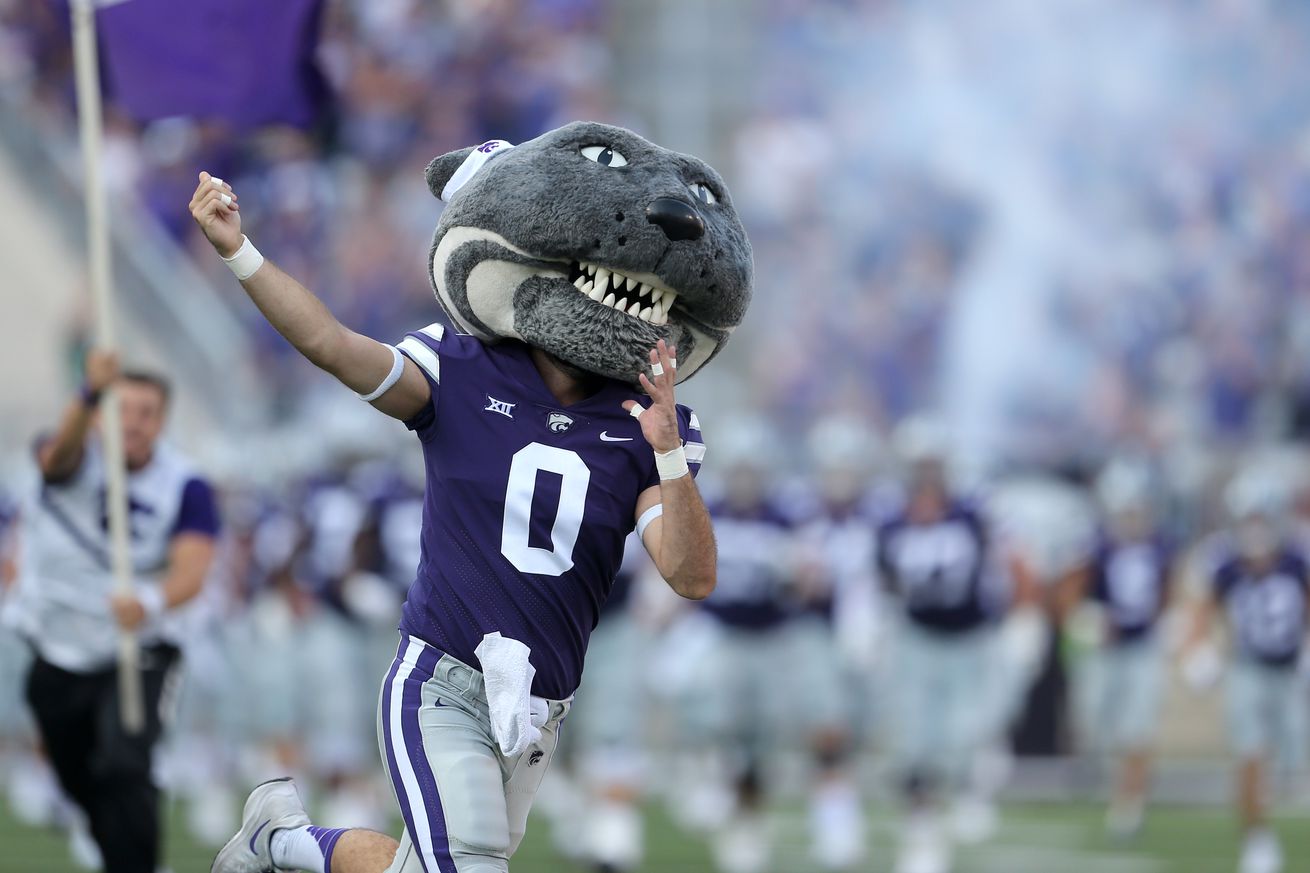 Sep 11, 2021; Manhattan, Kansas, USA; Kansas State Wildcats mascot Willie Wildcat leads the team onto the field before a game against the Southern Illinois Salukis at Bill Snyder Family Football Stadium.