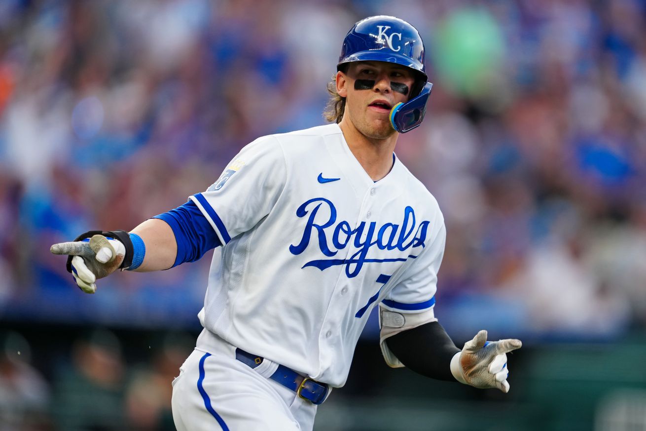 Kansas City Royals shortstop Bobby Witt Jr. (7) gestures to the dugout after hitting a home run against the Oakland Athletics during the fourth inning at Kauffman Stadium.