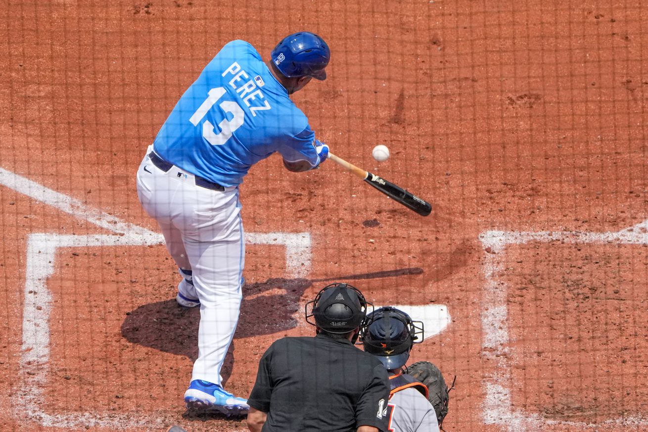 Kansas City, Missouri, USA; Kansas City Royals catcher Salvador Perez (13) singles against the Detroit Tigers in the fourth inning at Kauffman Stadium.