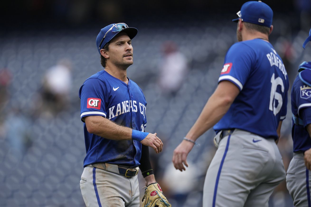 Adam Frazier #26 and Hunter Renfroe #16 of the Kansas City Royals celebrate after the team wins against the Washington Nationals at Nationals Park on September 26, 2024 in Washington, DC.