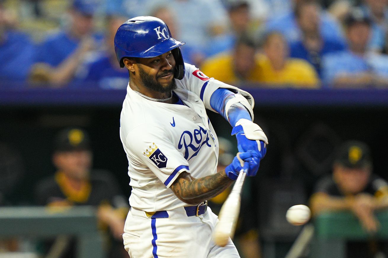 Maikel Garcia swings the bat during a game