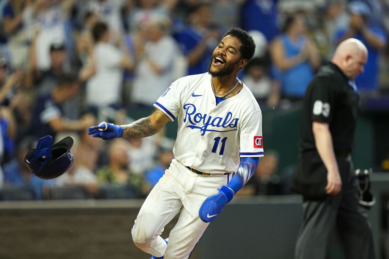 Kansas City Royals third baseman Maikel Garcia (11) celebrates