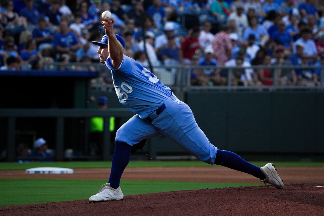 Kansas City Royals starting pitcher Kris Bubic (50) delivers a pitch